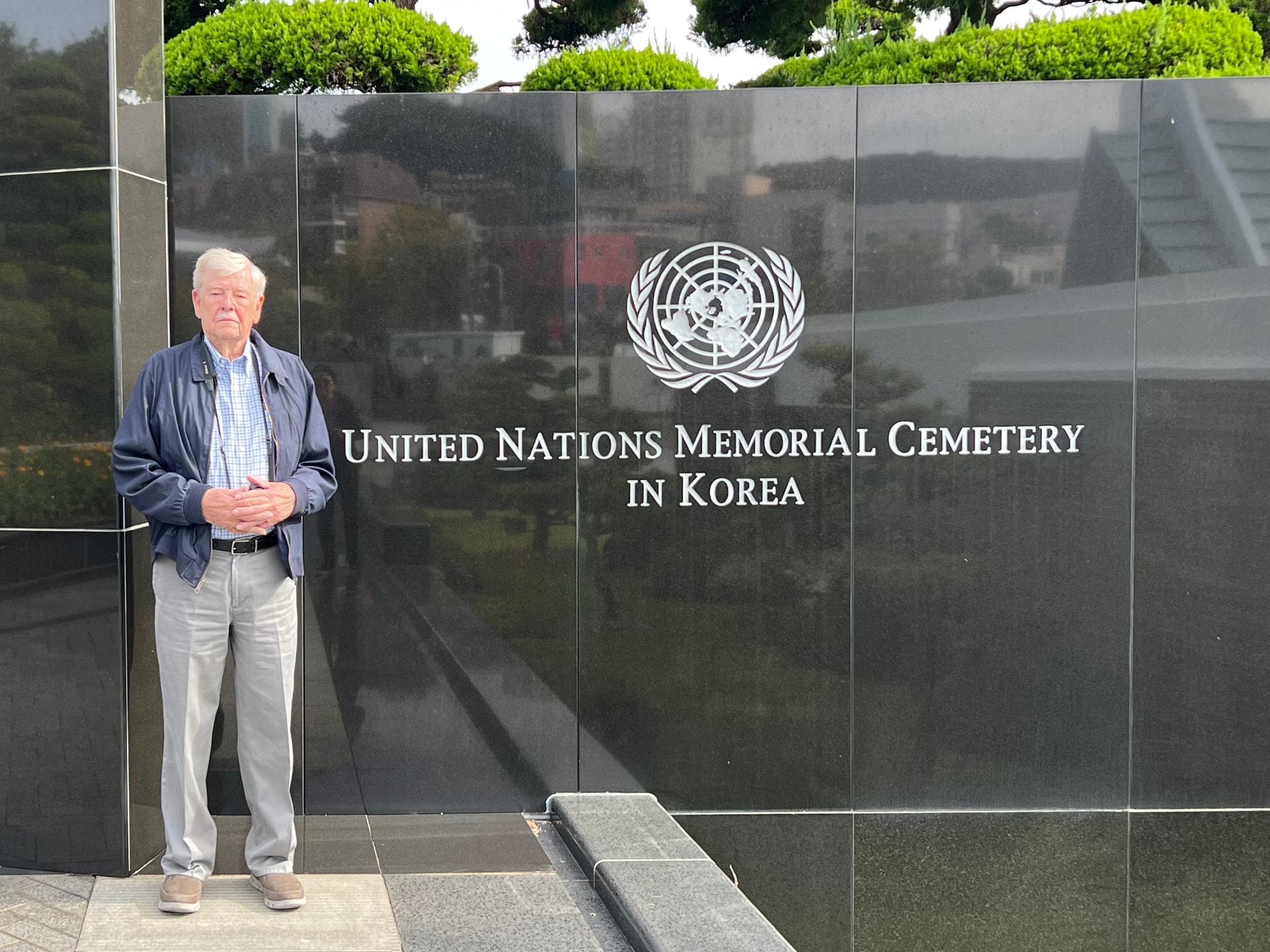 Laura's father standing at the United Nations Memorial Cemetery in Korea